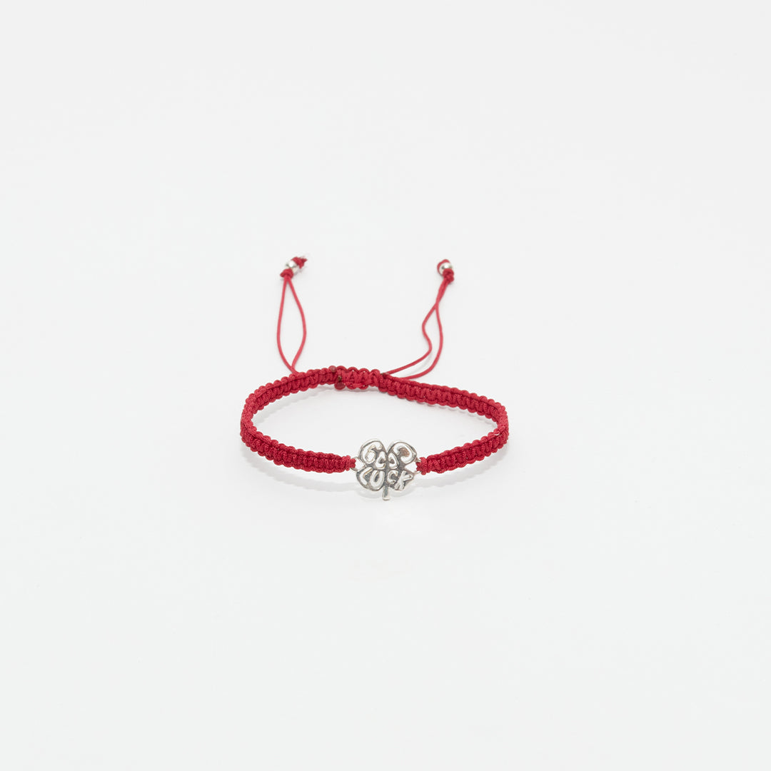 Pulsera tejida good Luck con dije en plata